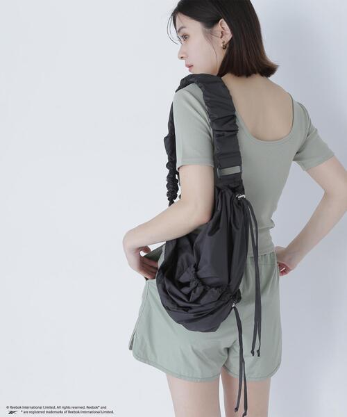 NATURAL BEAUTY BASIC(ナチュラルビューティーベーシック)の「【THINK BEAUTY】Reebok DRAWSTRING BAG(バックパック/リュック・レディース・ライトグリーン/ブラック・フリ-)」の13枚目の写真