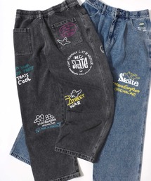 Mark Gonzales（マーク・ゴンザレス）の「MARK GONZALES ARTWORK COLLECTION/マークゴンザレス 別注 ストリートデザイン 総柄プリント ワイドデニムパンツ（デニムパンツ）」