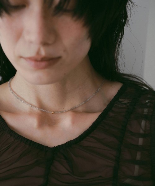 anuke(アンヌーク)の「Color Stone Necklace(ネックレス・レディース・アイボリー/ブラック・FREE)」の1枚目の写真