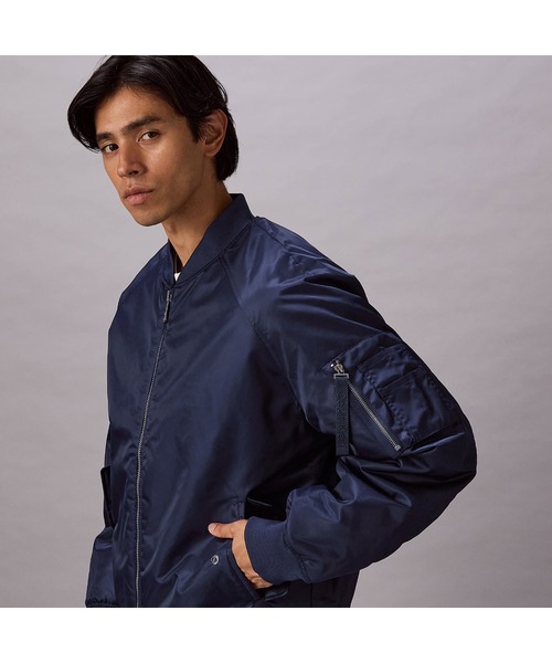 Calvin Klein(カルバン・クライン)の「ジャケット- ロングスリーブナイロンボンバージャケット(その他アウター・メンズ・ネイビー/オリーブ・L/M/S)」の2枚目の写真
