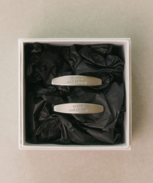 MUCU AND EBONY（ムクアンドエボニー）の「[ギフトラッピング] クラシックロゴヘアピン (2個) _ シルバー（ヘアピン）」