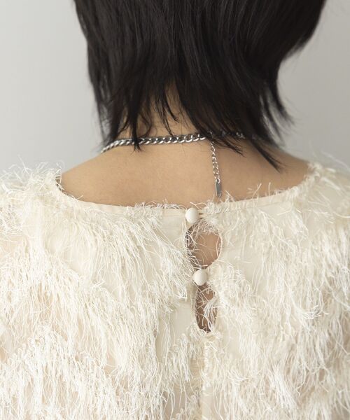 GARAGE OF GOOD CLOTHING（ガレージオブグッドクロージング）の「【日本製】フリンジVネックフレアプルオーバー（ベスト・レディース・ブラック/アイボリー・FREE）」の6枚目の写真