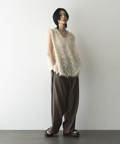 GARAGE OF GOOD CLOTHING（ガレージオブグッドクロージング）の「【日本製】フリンジVネックフレアプルオーバー（ベスト・レディース・ブラック/アイボリー・FREE）」の7枚目の写真