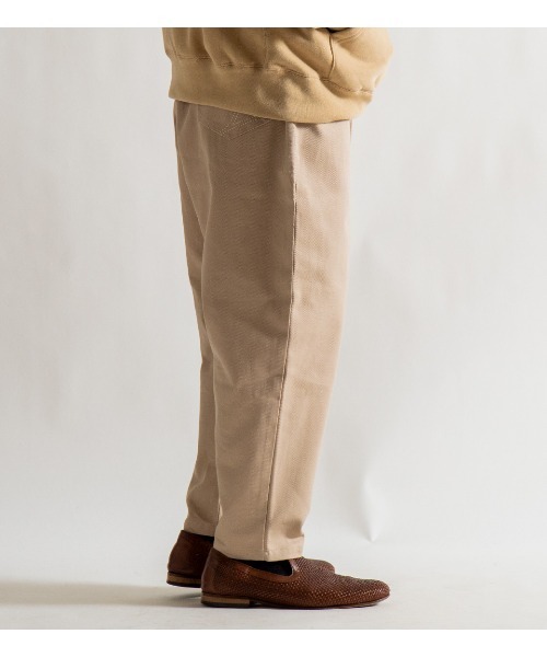 APPLEBUM アップルバム テーパードパンツ　ライトベージュ APPLEBUM（アップルバム）の「Loose Color Tapered Pants