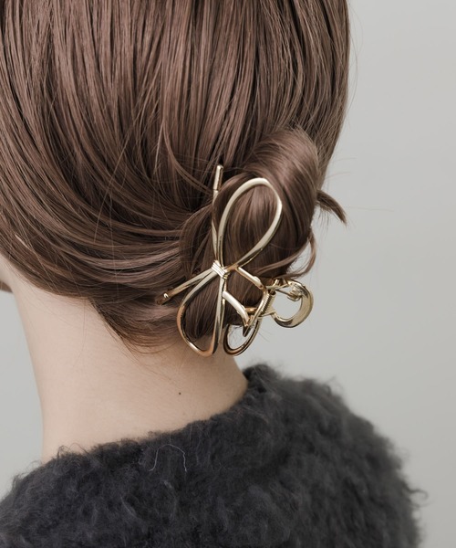 SMELLY（スメリー）の「メタルリボンバンス（バレッタ/ヘアクリップ・レディース・ゴールド・-）」の2枚目の写真