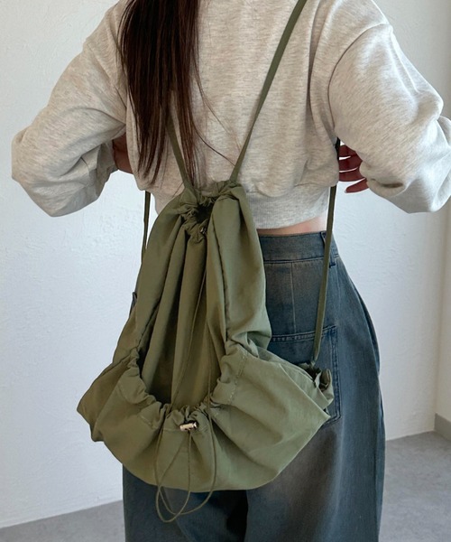 apres jour mignon(アプレジュールミニョン)の「【apresjour mignon×ARIAZ】ドロストナップザック(バックパック/リュック・レディース・ホワイト/カーキ/ブラック・ONESIZE)」の9枚目の写真