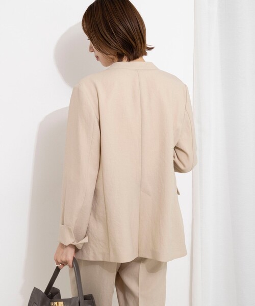 NOLLEY’S(ノーリーズ)の「《セットアップ対応》ストレッチツイルVネックジャケット(ノーカラージャケット・レディース・ネイビー/ベージュ・40/38/36)」の16枚目の写真