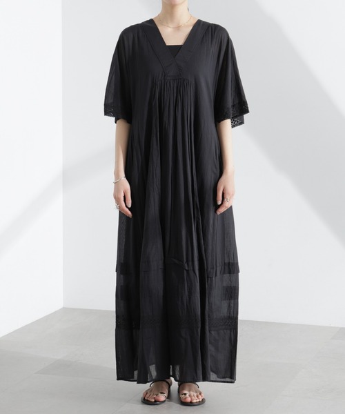 Sara mallika 黒の長袖ワンピース ボタン付き ゆったり Sara mallika 黒の長袖ワンピース ボタン付き ゆったり