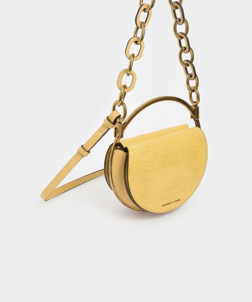 CHARLES & KEITH（チャールズ & キース）の「クロックエフェクト サーキュラーバッグ / Croc-Effect Circular Bag（クラッチバッグ・レディース・ブラック/イエロー/マルチ/タン・S）」の16枚目の写真