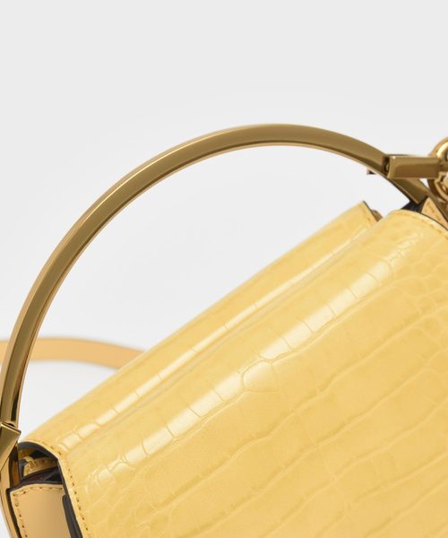 CHARLES & KEITH（チャールズ & キース）の「クロックエフェクト サーキュラーバッグ / Croc-Effect Circular Bag（クラッチバッグ・レディース・ブラック/イエロー/マルチ/タン・S）」の17枚目の写真