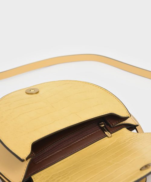 CHARLES & KEITH（チャールズ & キース）の「クロックエフェクト サーキュラーバッグ / Croc-Effect Circular Bag（クラッチバッグ・レディース・ブラック/イエロー/マルチ/タン・S）」の18枚目の写真