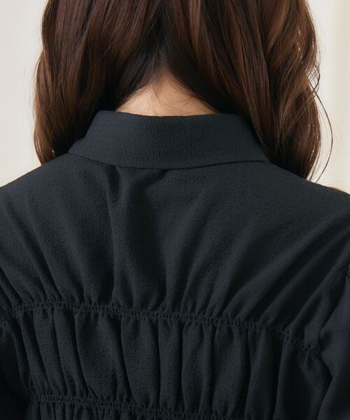 ems excite（エムズエキサイト）の「ポコポコリボンペプラムSH（シャツ/ブラウス・レディース・ブルー/ブラック/ホワイト・FREE）」の8枚目の写真