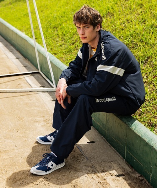 【新品未使用】【le coq sportif】 Vネック ウィンドブレーカー 裏メッシュ付きウィンドブレーカー（ナイロンジャケット）｜le coq