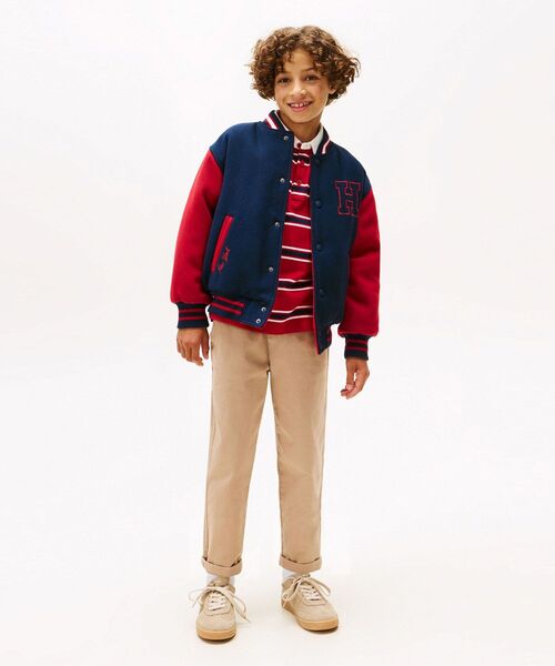 TOMMY HILFIGER(トミーヒルフィガー)の「BOYS リバーシブルトミーグラフィックボンバージャケット(ブルゾン・キッズ・ネイビー・160cm/130cm/150cm/140cm)」の3枚目の写真