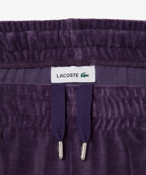 LACOSTE（ラコステ）の「ベロアタッチパイピングトラックパンツ（スウェットパンツ・レディース・ダークブルー・34/36/38/40）」の14枚目の写真
