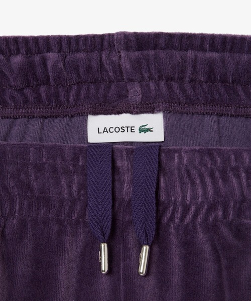 LACOSTE（ラコステ）の「ベロアタッチパイピングトラックパンツ（スウェットパンツ・レディース・ダークブルー・34/36/38/40）」の5枚目の写真