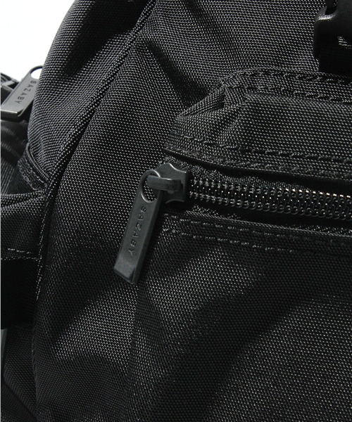 SAZABY（サザビー）の「ﾌｧﾌﾞﾘｯｸﾊﾞｯｸﾞMFJ14664（バックパック/リュック・メンズ・ブラック/ネイビー・FREE）」の7枚目の写真