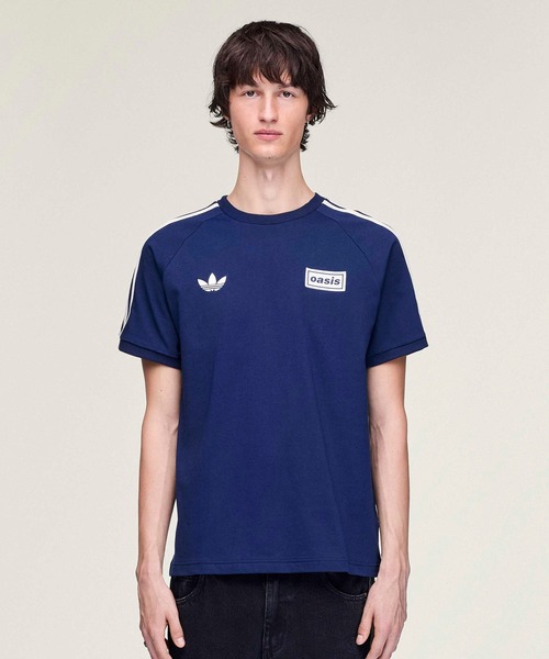 adidas Originals × Oasis ツアースリーストライプス Tシャツ