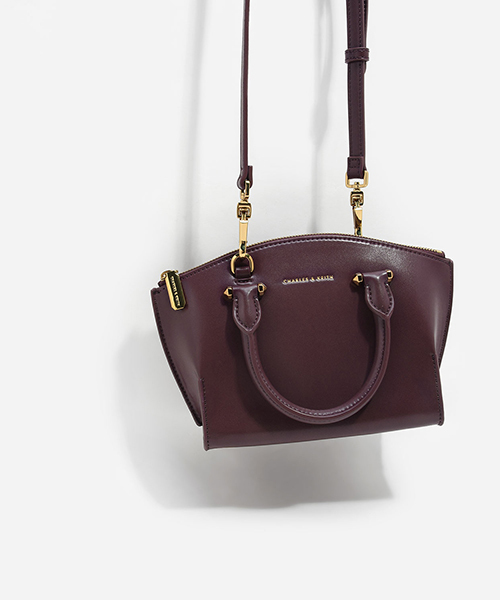 CHARLES & KEITH(チャールズ & キース)の「カーブジップハンドバッグ / CURVED ZIP HANDBAG(ハンドバッグ・レディース・プラム/レンガ/ブラック・S)」の7枚目の写真