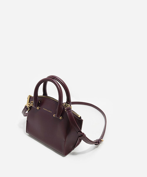 CHARLES & KEITH(チャールズ & キース)の「カーブジップハンドバッグ / CURVED ZIP HANDBAG(ハンドバッグ・レディース・プラム/レンガ/ブラック・S)」の8枚目の写真