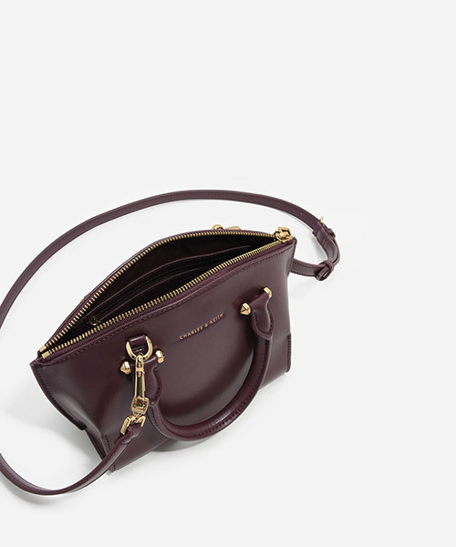 CHARLES & KEITH(チャールズ & キース)の「カーブジップハンドバッグ / CURVED ZIP HANDBAG(ハンドバッグ・レディース・プラム/レンガ/ブラック・S)」の9枚目の写真