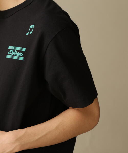 AVIREX(アヴィレックス)の「WEST COAST T-SHIRT PIN UP & COCKTAIL / ウエスト コースト Tシャツ ピンナップ & カクテル / AVIREX / アヴィレックス(Tシャツ/カットソー・メンズ・ネイビー/ゴールド/ホワイト/ブラック・MEDIUM/LARGE/X-LARGE/XX-LARGE)」の6枚目の写真