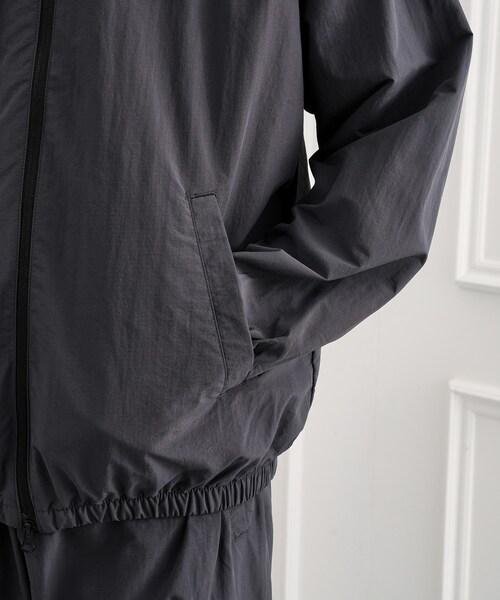 TAKEO KIKUCHI（タケオキクチ）の「TKDWトレーニングブルゾン（ブルゾン・メンズ・チャコールグレー/ブラック・02/03）」の9枚目の写真