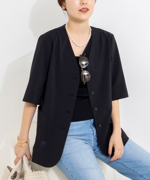 NOLLEY’S(ノーリーズ)の「ウォッシャブル高機能半袖ジャケット(ノーカラージャケット・レディース・ブラック/ホワイト・38/36)」の1枚目の写真