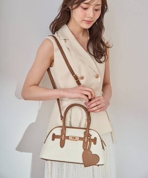 31 Sons de mode(トランテアン ソン ドゥ モード)の「雑材ベルトボストンバッグ(ボストンバッグ・レディース・オフホワイト/ベージュ・フリー)」の1枚目の写真