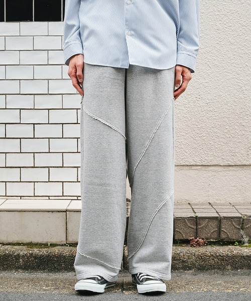 STUDIOUS(ステュディオス)の「【Jieda】別注 DISTORTED SWEAT PANTS(スウェットパンツ・メンズ・ブラック/グレー・1/2)」の2枚目の写真
