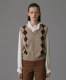 TTUDEMENT（トュードメント）の「MUTED ARGYLE VEST BEIGE（ベスト）」