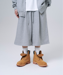 MOOVN（ムブン）の「バミューダツータックロングスウェットパンツショートグレー（その他パンツ）」