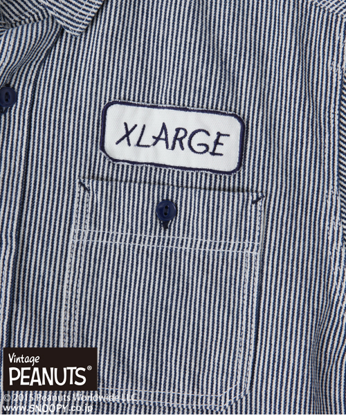 XLARGE　スヌーピーコラボ　ヒッコリー半袖シャツ　ヴィンテージピーナッツ XLARGE（エクストララージ）の「XLARGE×SNOOPY S/S HICKORY WORK