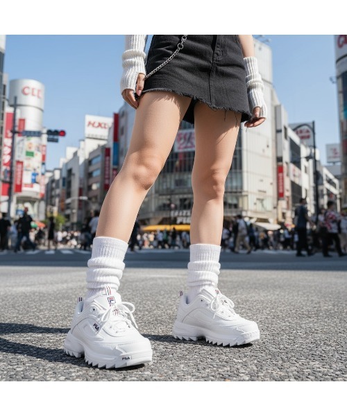 FILA（フィラ）の「DISTORTER PREMIUM（スニーカー・レディース・ブラック/ホワイト・22.5cm/22.0cm/26.5cm/27.0cm/28.0cm/23.0cm/23.5cm/24.0cm/24.5cm/25.0cm/25.5cm/26.0cm）」の2枚目の写真