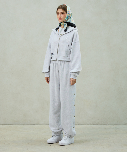 ARI(アリ)の「PITA SNAP OFF SWEAT PANTS / WHITE-MELANGE(スウェットパンツ・レディース・ライトグレー・FREE)」の3枚目の写真