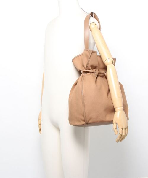 the dilettante（ザ・ディレッタント）の「【the dilettante】別注ドロストリングバッグ（トートバッグ・レディース・ベージュ/ホワイト・FREE）」の6枚目の写真