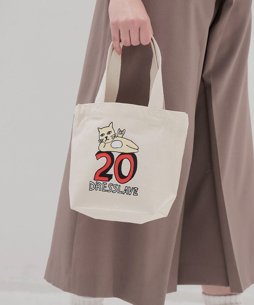 BLACK SCORE(ブラックスコア)の「BLACK SCORE × DRESSLAVE / 20th act cocky tote(アニバーサリー アクトコッキーミニトートバッグ BSBMT CANVAS MINI BAG)(トートバッグ・レディース・ナチュラル・FREE)」の1枚目の写真