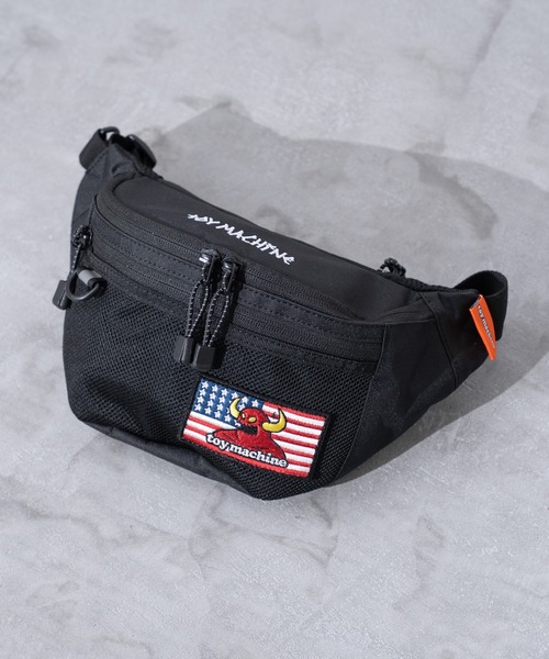 JUGLANS(ユグランス)の「【TOYMACHINE】SLING BAG(ボディバッグ/ウエストポーチ・メンズ・ライトブラウン/ブラック/ブラック系その他・FREE)」の1枚目の写真