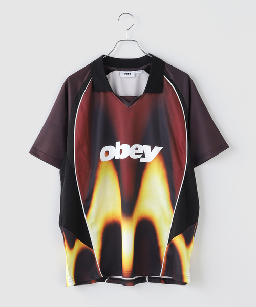 OBEY(オベイ)の「OBEY / オベイ BLURRED SOCCER JERSEY(Tシャツ/カットソー・メンズ・レッド/ブルー・LARGE/MEDIUM)」の2枚目の写真