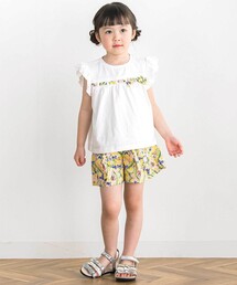 BeBe Petits Pois Vert（ベベプチポワヴェール）の「【店舗限定】フラワーリボンフリルトップス＆ショートパンツセット(95～150cm)（セットアップ）」