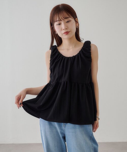 DISCOAT(ディスコート)の「前後2WAYリボンペプラムプルオーバー(Tシャツ/カットソー・レディース・オフホワイト/ブラウン/ブラック・FREE)」の1枚目の写真