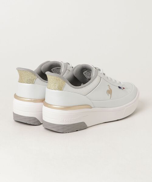 le coq sportif（ルコックスポルティフ）の「LCS セーヴル リフト III SI  /  LCS SEVRES LIFT III SI（スニーカー・レディース・ブルー系その他6/ホワイト×ゴールド・23.5cm/24.0cm/24.5cm/25.0cm/23.0cm/22.5cm）」の3枚目の写真