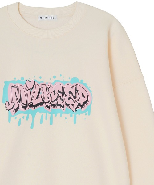 MILKFED.(ミルクフェド)の「GRAFFITI BIGSWEAT TOP(スウェット・レディース・ライトブルー/ブラック/オフホワイト/ライトパープル・ONE SIZE)」の1枚目の写真