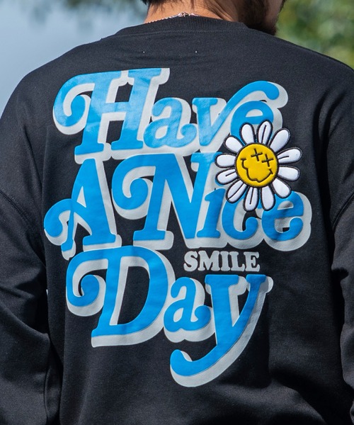 『SMILEY FACE/スマイリーフェイス』フラワースマイリープリント裏毛トレーナー（スウェット）｜SMILEY FACE（スマイリーフェイス）