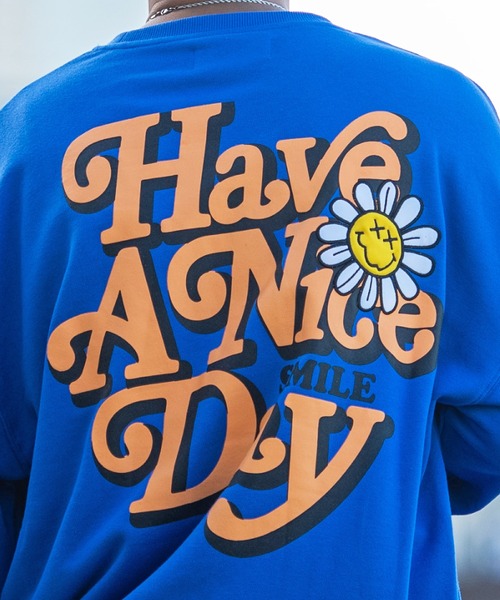 『SMILEY FACE/スマイリーフェイス』フラワースマイリープリント裏毛トレーナー（スウェット）｜SMILEY FACE（スマイリーフェイス）