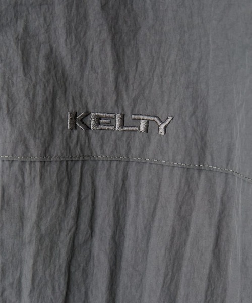 KELTY（ケルティ）の「[KELTY/ケルティ] 別注 中綿入り サイドスリットナイロンベスト（ベスト・レディース・アイボリー/ブラック/チャコール・S/M）」の9枚目の写真