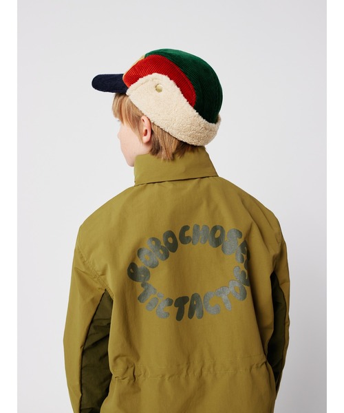 BOBO CHOSES（ボボショーズ）の「Tic Tac Toe raincoat（ナイロンジャケット・キッズ・カーキ・8-9y/4-5YEAR/12-13y/10-11y/6-7YEAR/2-3YEAR）」の8枚目の写真