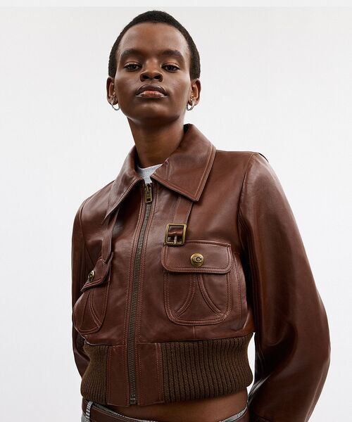 COACH（コーチ）の「シュランケン レザー アビエーター ジャケット（その他アウター・レディース・ブラウン系その他・MEDIUM/SMALL）」の2枚目の写真