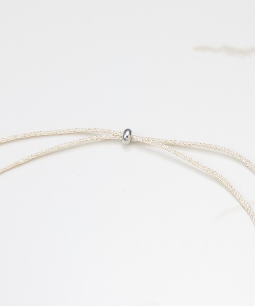 PAPILLONNER(パピヨネ)の「コードネックレス(ネックレス・レディース・アイボリー/ブラック・FREE)」の12枚目の写真