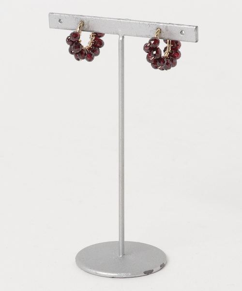 tone(トーン)の「【marinaJEWELRY】14kgf/AAA Garnet wrapped earring(イヤリング・レディース・レッド・S)」の1枚目の写真
